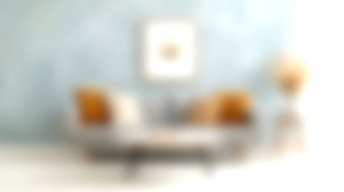 Yastıklarla bezenmiş rahat gri bir kanepenin bulunduğu modern dekorların oluşturduğu yumuşak mavi bir duvara yaslanmış şık bir oturma odası keşfedin..