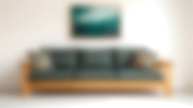 Renkli yastıkların yer aldığı rahat, modern bir kanepe duvarda soyut bir sanat eserini tamamlıyor ve her oturma odası için şık ve davetkar bir ortam yaratıyor..