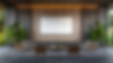 Bu resim, geniş bir oturma alanı ve yemyeşil bir ekran ile çevrili, modern, minimalist bir iç tasarımı içerir..