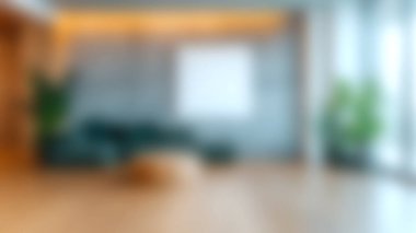 Minimalist mobilyaların, beton duvarların ve yemyeşil yeşilliğin yer aldığı sakin ve modern bir oturma odası. Rahatlamak için mükemmel bir ortam yaratıyor..