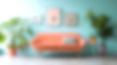 Mercan kanepesi, yeşil bitkiler ve canlı duvar sanatının yer aldığı güzel bir oturma odası. Açık mavi arka plan modern ve davetkar atmosferi arttırır..