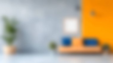 Bu modern oturma odasında gri ve turuncu bir duvarın önünde şık bir kanepe var. Dekoratif yastıklar ve bereketli ev bitkileri aksanlı, canlı bir atmosfer yaratıyor..