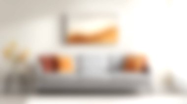 Sıcak ve davetkar, turuncu yastıklı yumuşak bir kanepe ve rahatlatıcı duvar resmi ve şık bir sehpa ile tamamlanmış bir oturma odası..