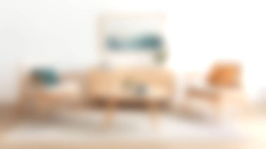 Bu rahat minimalist oturma odası yumuşak renklere ve doğal ışığa sahip, hoş bir karşılama alanı yaratıyor. Mobilya düzenlemesi rahatlamayı ve rahatlığı teşvik ediyor..