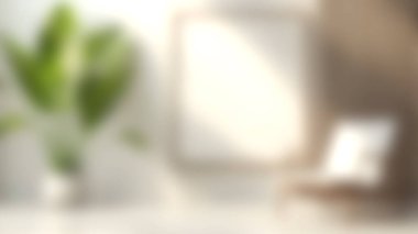 Bu görüntü, yeşil bir bitki ve minimalist bir çerçeve içeren parlak ve havadar bir iç mekan yakalar. Ev ve yaşam tarzı temaları için ideal.