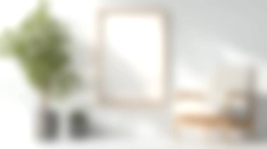 Bu resim, dekoratif bir bitki ve beyaz bir duvara karşı boş bir fotoğraf çerçevesinin yer aldığı parlak, minimalist bir yaşam alanını gösteriyor, davetkar bir atmosfer yaratıyor..