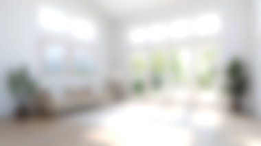 Geniş pencereli, minimalist dekorlu, parlak ve havadar modern bir oturma odası ve sakin bir atmosfer yaratan doğal ışık..