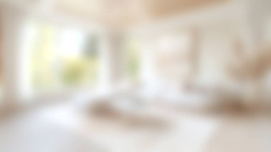 Doğal ışıkla dolu sakin bir oturma odası modern dekor elementleri ve rahat bir atmosfer sergiliyor. Tasarım yumuşak renklere ve ahşap aksanlara sahiptir..