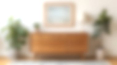 Modern bir oturma odası keşfedin ahşap mobilyalar ve yemyeşil bitkiler, rahat ve davetkar bir atmosfer yaratın, rahatlama ve stil için mükemmel.