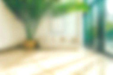 Bu resim, parlak ve havadar bir iç mekanı betimliyor. İçerisi bereketli bir iç mekan, güneşli zeminler ve sakin bir ortam, rahatlama ve sükunet için mükemmel..