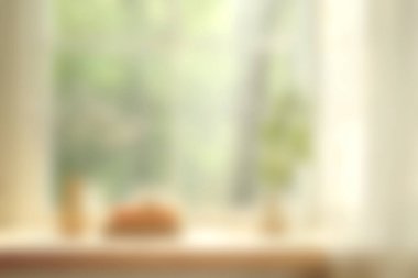 Yumuşak bir ışığın pencereden içeri aktığı sakin bir mutfak sahnesi, yeşil bir bitki, ve davetkar bir dekor, sıcaklık ve konfor uyandırmak için mükemmel..