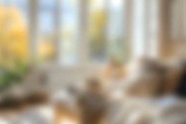 Bu rahat iç mekan yumuşak dokulara ve sıcak ışığa sahip. Rahatlamak için mükemmel huzurlu bir atmosfer yaratıyor. Ev dekorasyonu temaları için ideal.