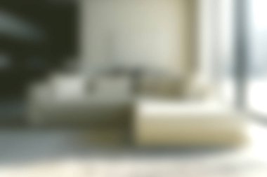 Zarif, modern bir oturma odası. Minimalist bir tasarımı ve bol doğal ışığı var. Alan rahat bir oturma düzenini içerir rahatlama ve toplanma için mükemmel.