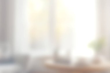 Parlak ve havadar bir yaşam alanı, basit dekor ve bitkilerin yer aldığı doğal ışıkla yıkanmış. Yumuşak odak, dinlenmek için ideal sakin bir ortam yaratır..