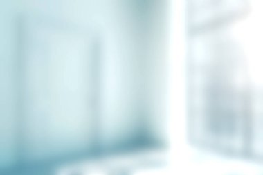 Yumuşak, parlak doğal ışıkla yıkanmış sakin, minimalist bir iç mekan. Bulanık odak sakin bir atmosfer yaratıyor, rahatlamak için mükemmel..