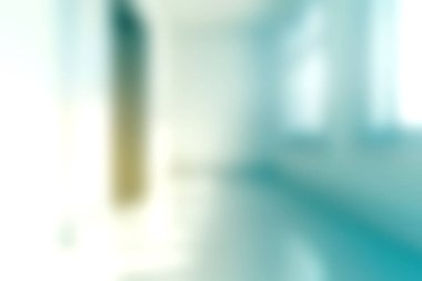 Bu resim, aydınlık duvarlar ve tasarım ilhamı için ideal temiz bir zemini aydınlatan, doğal ışıkla dolu, hafif bulanık, boş bir odayı gösteriyor..