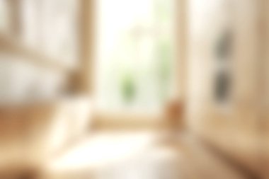 Doğal ışık, minimalist dekor ve rahatlama ve rahatlama için mükemmel sıcak bir atmosfer ile dolu rahat bir oturma odasının yumuşak odaklı görüntüsü..