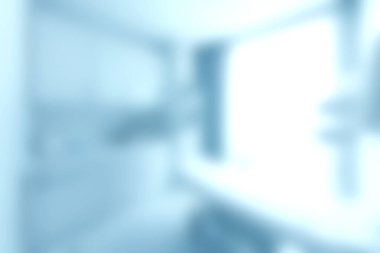 Bu yumuşak odaklı görüntü parlak ve modern bir yaşam alanı yakalıyor, herhangi bir evde rahatlık ve sükuneti teşvik eden minimalist dekorlar sergiliyor..