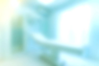 Bu resim, hasta rahatlığı ve refahı için ideal huzurlu ve temiz bir ortam yakalayan yumuşak ve bulanık bir modern sağlık sistemini tasvir ediyor..