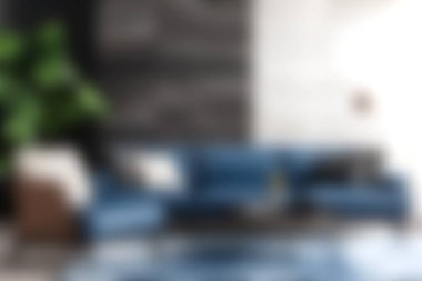 Şık mavi bir kanepe, zarif dekoratif elementler ve canlı iç mekan bitkilerinin olduğu rahat bir oturma odası keşfedin. Modern iç mekanlar için mükemmel..