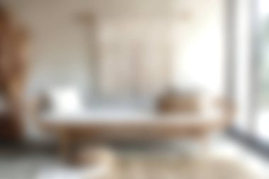 Rahat, minimalist bir oturma odası. Toprak renkleri ve bol doğal ışık var. Rahatlama ve şık bir dekor için mükemmel. Modern tasarım sıcaklığı arttırır..