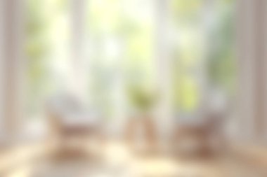 Bu resim, doğal ışık ve rahat oturma ve yeşillik içeren huzurlu bir oturma odası yakalıyor. Ev dekorasyonu ve rahatlama temaları için ideal.