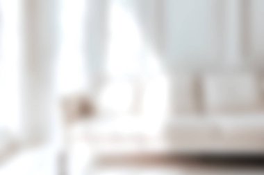 Yumuşak dokuların ve doğal ışığın bol olduğu parlak ve minimalist bir oturma odasını keşfedin. Rahatlama ve rahatlama için mükemmel sakin ve davetkar bir atmosfer yaratın..