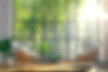 Doğal ışığın, yemyeşil bitkilerin ve rahat koltukların olduğu güzel tasarlanmış bir oturma odası. Rahatlatıcı ve davetkar bir atmosferi mükemmel bir şekilde yakalıyor..