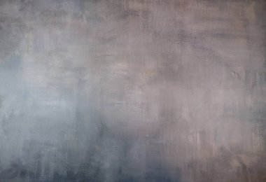 Gray background with a textured surface. The wall seems unfinished and has several gross texture