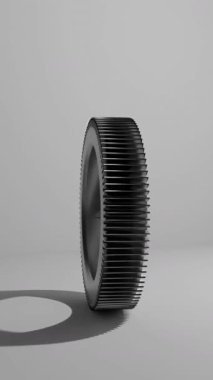 Temiz beyaz yüzey üzerinde dönen dişli, pürüzsüz döngü, minimal video