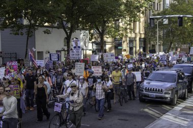 PORTLAND, OR  SEPTEMBER 28, 2025 Demonstrators gathered at the Battleship Oregon Memorial for a peaceful rally and march through downtown Portland opposing the deployment of federal forces.  The protests are sponsored by SEIU Local 503, the ACLU of