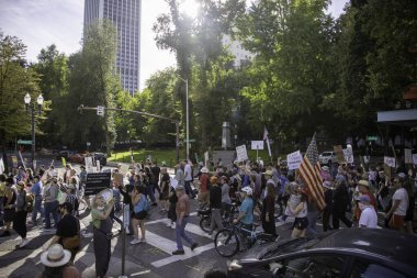 PORTLAND, OR  SEPTEMBER 28, 2025 Demonstrators gathered at the Battleship Oregon Memorial for a peaceful rally and march through downtown Portland opposing the deployment of federal forces.  The protests are sponsored by SEIU Local 503, the ACLU of