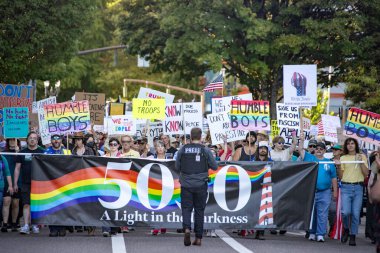 PORTLAND, OR  SEPTEMBER 28, 2025 Demonstrators gathered at the Battleship Oregon Memorial for a peaceful rally and march through downtown Portland opposing the deployment of federal forces.  The protests are sponsored by SEIU Local 503, the ACLU of
