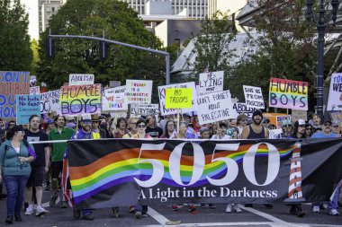 PORTLAND, OR  SEPTEMBER 28, 2025 Demonstrators gathered at the Battleship Oregon Memorial for a peaceful rally and march through downtown Portland opposing the deployment of federal forces.  The protests are sponsored by SEIU Local 503, the ACLU of