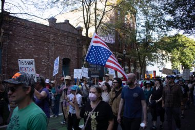 PORTLAND, OR  SEPTEMBER 28, 2025 Demonstrators gathered at the Battleship Oregon Memorial for a peaceful rally and march through downtown Portland opposing the deployment of federal forces.  The protests are sponsored by SEIU Local 503, the ACLU of