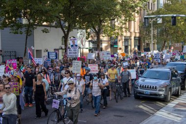 PORTLAND, OR  SEPTEMBER 28, 2025 Demonstrators gathered at the Battleship Oregon Memorial for a peaceful rally and march through downtown Portland opposing the deployment of federal forces.  The protests are sponsored by SEIU Local 503, the ACLU of