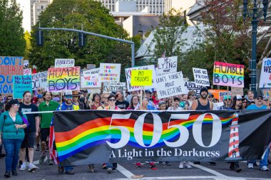 PORTLAND, OR  SEPTEMBER 28, 2025 Demonstrators gathered at the Battleship Oregon Memorial for a peaceful rally and march through downtown Portland opposing the deployment of federal forces.  The protests are sponsored by SEIU Local 503, the ACLU of