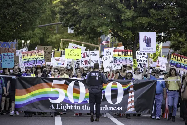 PORTLAND, OR  SEPTEMBER 28, 2025 Demonstrators gathered at the Battleship Oregon Memorial for a peaceful rally and march through downtown Portland opposing the deployment of federal forces.  The protests are sponsored by SEIU Local 503, the ACLU of
