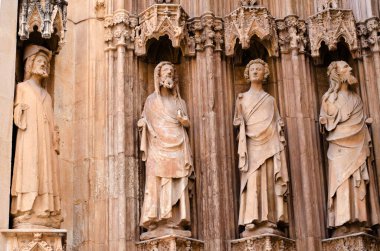 Valencia, Spain. 25-8-2025. Statues on the facade of the Water Tribunal in Valencia