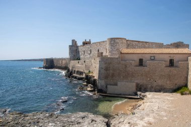 The Castello Maniace is a citadel and castle in Syracuse, Sicily,  situated at the far point of the Ortygia island promontory, where it was constructed between 1232 and 1240