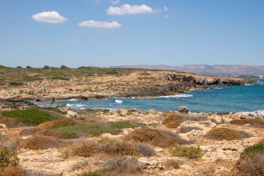 The path between sea and lagoon in the Vendicari Nature Reserve wildlife oasis, located between Noto and Marzamemi, Sicily, Italy