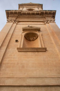 detail of baroque  decoration representing a shell on the bell tower of Saint Nicholas cathedral of Noto
