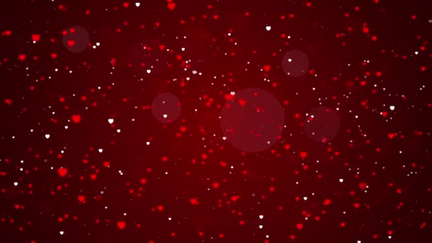 4K心脏浪漫抽象发光粒子抽象圣诞梯度背景 — 图库视频影像