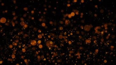 Uzayda parlak parlak parlak parlak altın renkli partiküller soyut arka plan. 4K 3D parlayan yüzen alevler Bokeh yıldız toz zerreleri havada parlayan bokeh. Sihirli peri. Yeni yıl Noel 2024