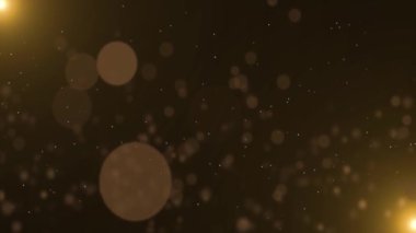 Işıltının altın ışınları patlayarak enerji saçar. Kıvılcım saçar Noel arkaplan tasarımı. Parlayan yıldızlar toza bokeh sim tozu verir. Bokeh konfetisi. Yeni yıl ya da doğum günü kutlaması. Karnaval lüksü