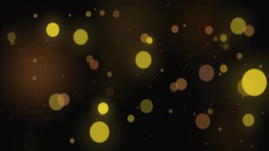 Altın ışık parçacıklarının arkaplanı yükseliyor, parçacıklar Altın Lüks Bokeh parçacıklarının sahnesini dalgalandırıyor hava toz parçacıkları parıldıyor. Parlayan yıldızlar toz bokeh sim tozu ödüllendirir. Noel, Ödül, Kutlama,