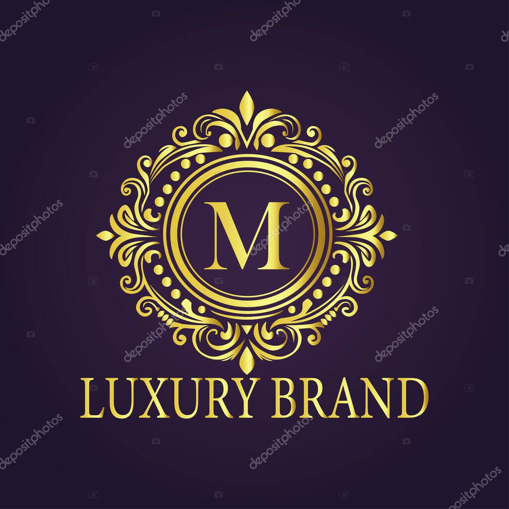 Letter M luxury gold logo concept