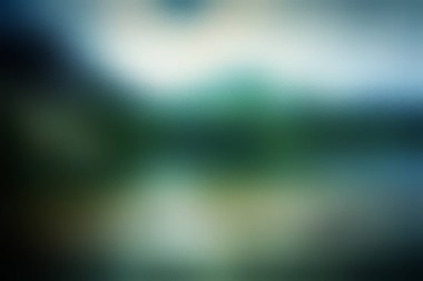 Arka plan olarak yeşil çimen bokeh. Bulanık manzara, tasarım şablonu. Yüksek kalite fotoğraf