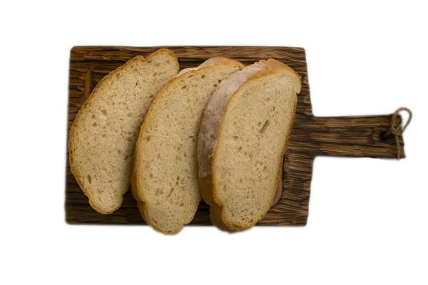 Roti Putih Dipotong Pada Papan Yang Terisolasi Pada Latar Belakang — Stok Foto