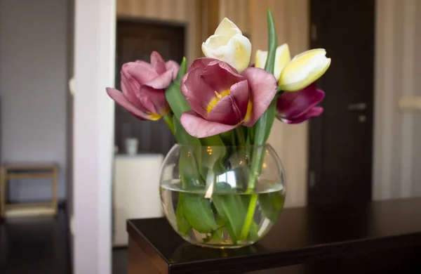 stock image Bouquet of beautiful spring tulips in the room